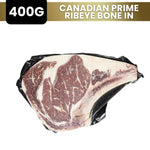 Load image into Gallery viewer, Canadian Prime Ribeye Bone In meat package with weight label on a white background
